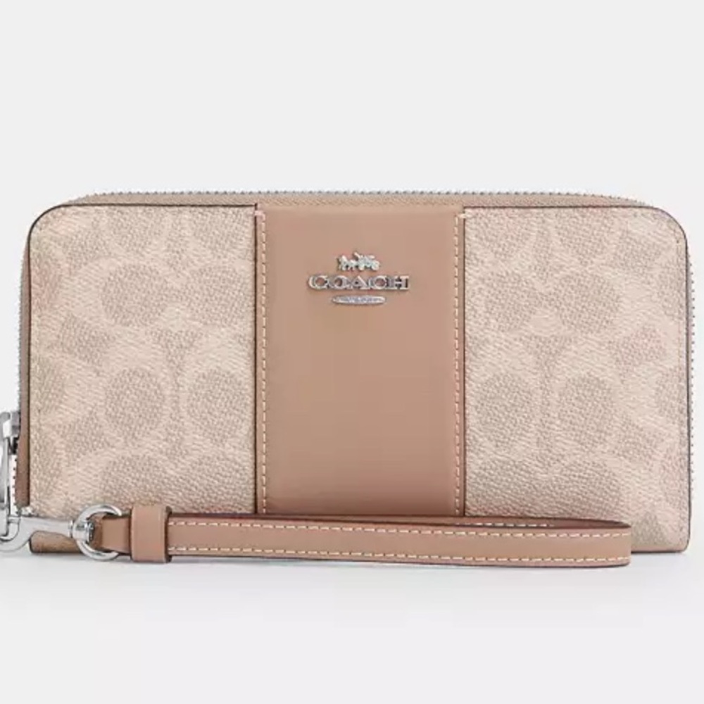 Coach Long Zip Around Wallet
In Signature Canvas With Stripe